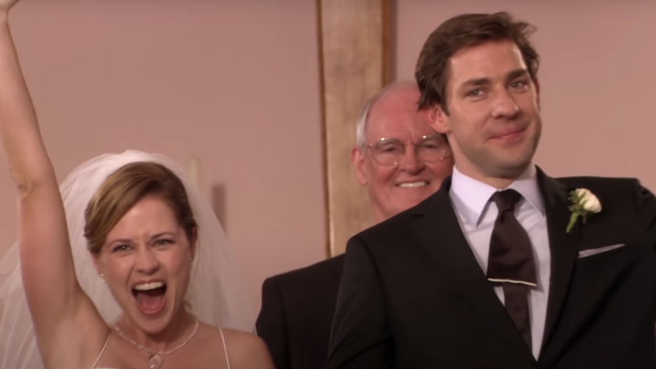 Pam and Jim looking happy after just getting married.