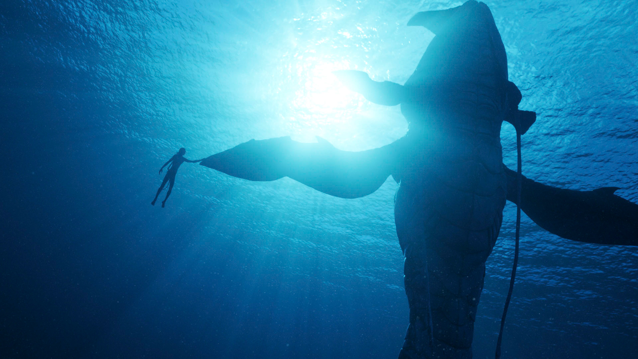 Na'vi et baleine dans Avatar : La Voie de l'Eau