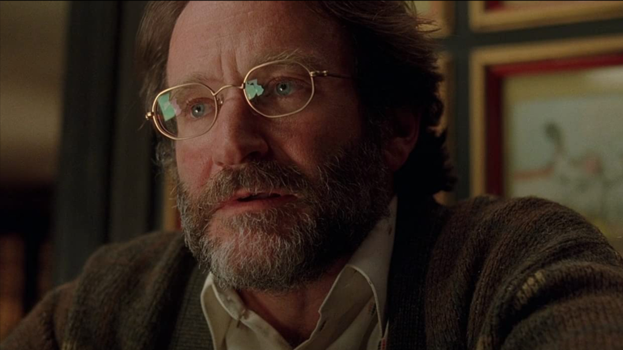 Robin Williams siège solennellement à Good Will Hunting.