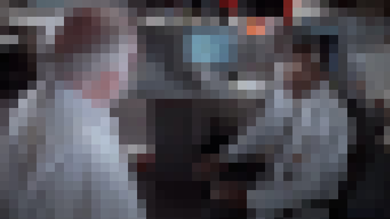 Сэр Ричард Аттенборо и Сэмюэл Л. Джексон разговаривают в диспетчерской Парка Юрского периода, в пиксельной форме.