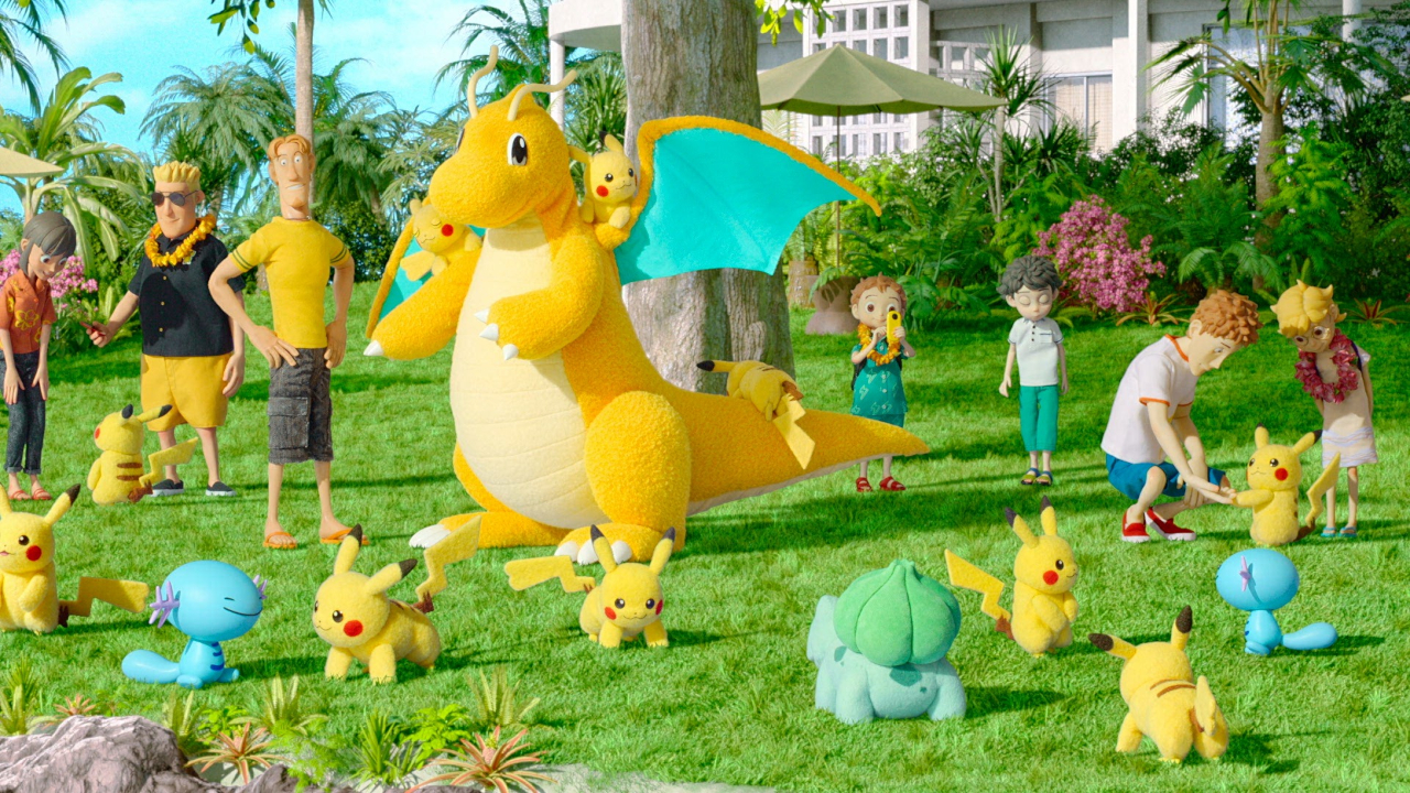 Ein Haufen Pokémon entspannt sich in Pokémon Concierge auf dem Resortgelände.