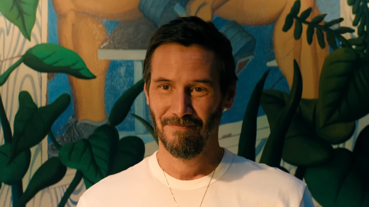 Keanu Reeves sourit dans Outcome