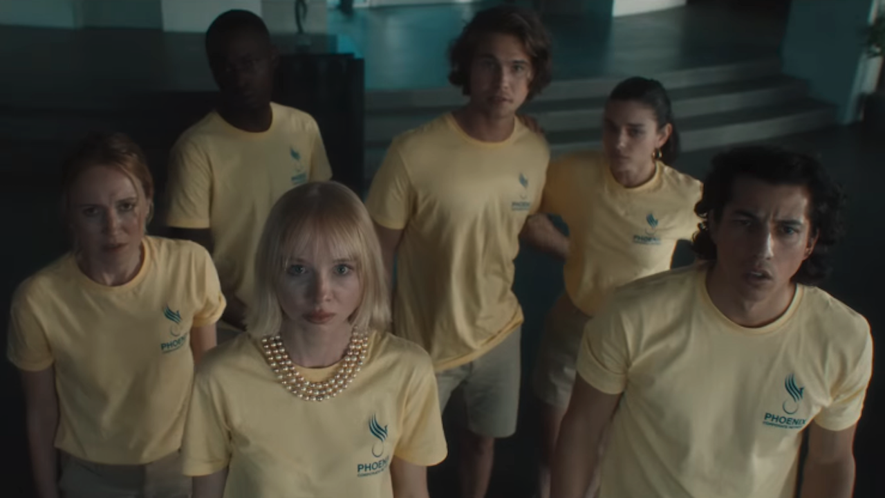 Corporate Retreat screenshot of employees in yellow shirts