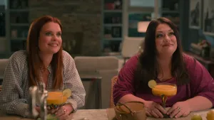 JoAnna Garcia Swisher as Maddie Townsend and Brooke Elliott as Dana Sue, drinking margaritas in a still image from 